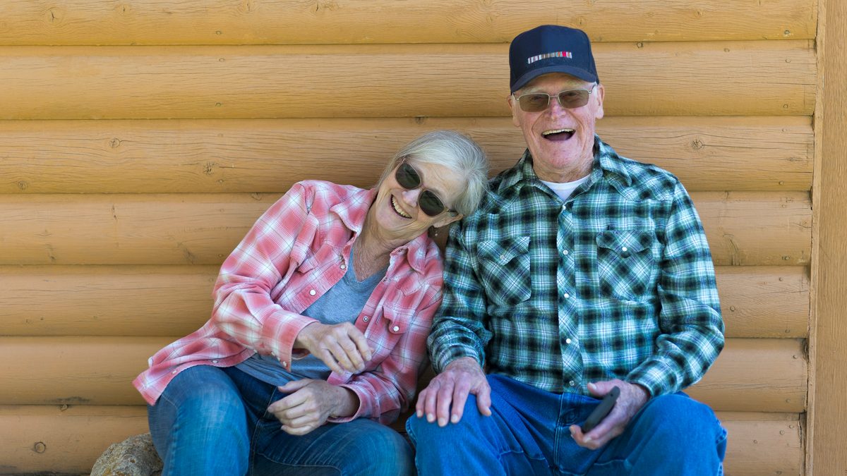 Older couple relaxing outdoors.