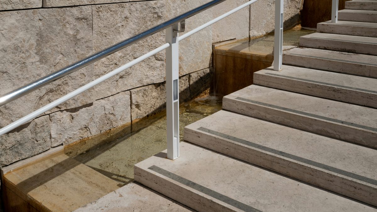 Stairs with a handrail.
